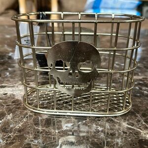 Spooky night metal basket holder.